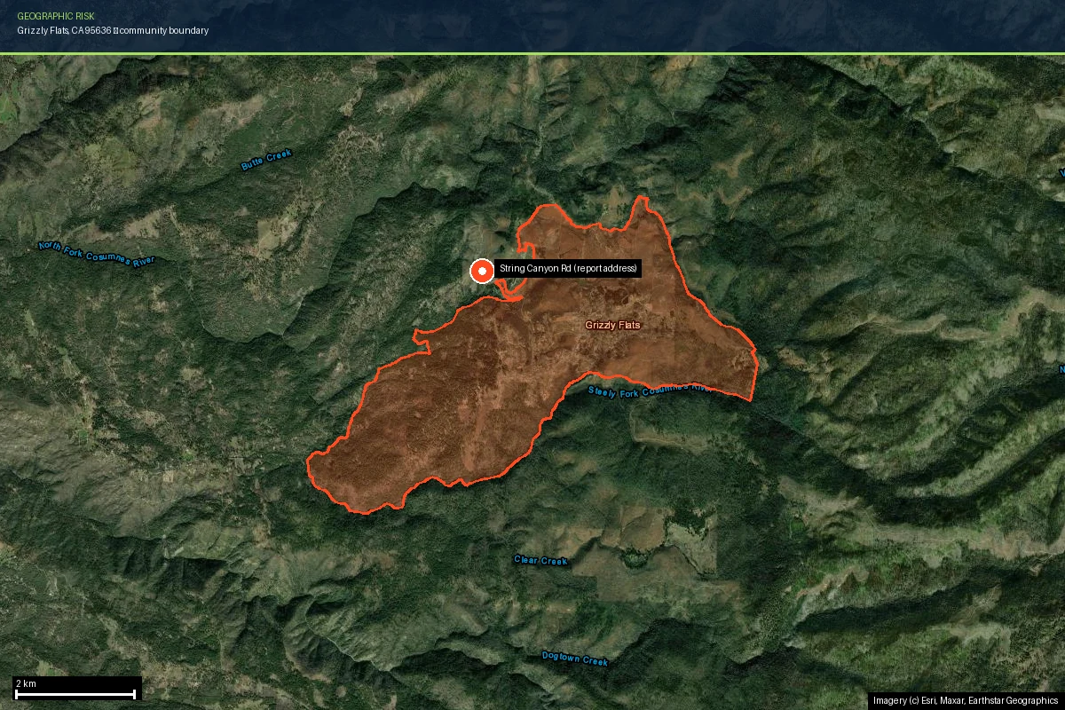 Grizzly Flats community boundary outlined on current satellite imagery, showing the town sitting inside the visible grey-brown burn scar of the 2021 Caldor Fire