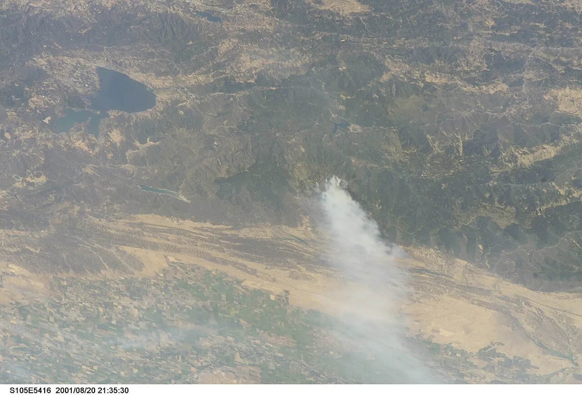 Trough Fire (2001) in Glenn County, California - After undocking with Space Station Alpha, on August 20, 2001, astronauts on the Space Shuttle photographed wildfires burning in th