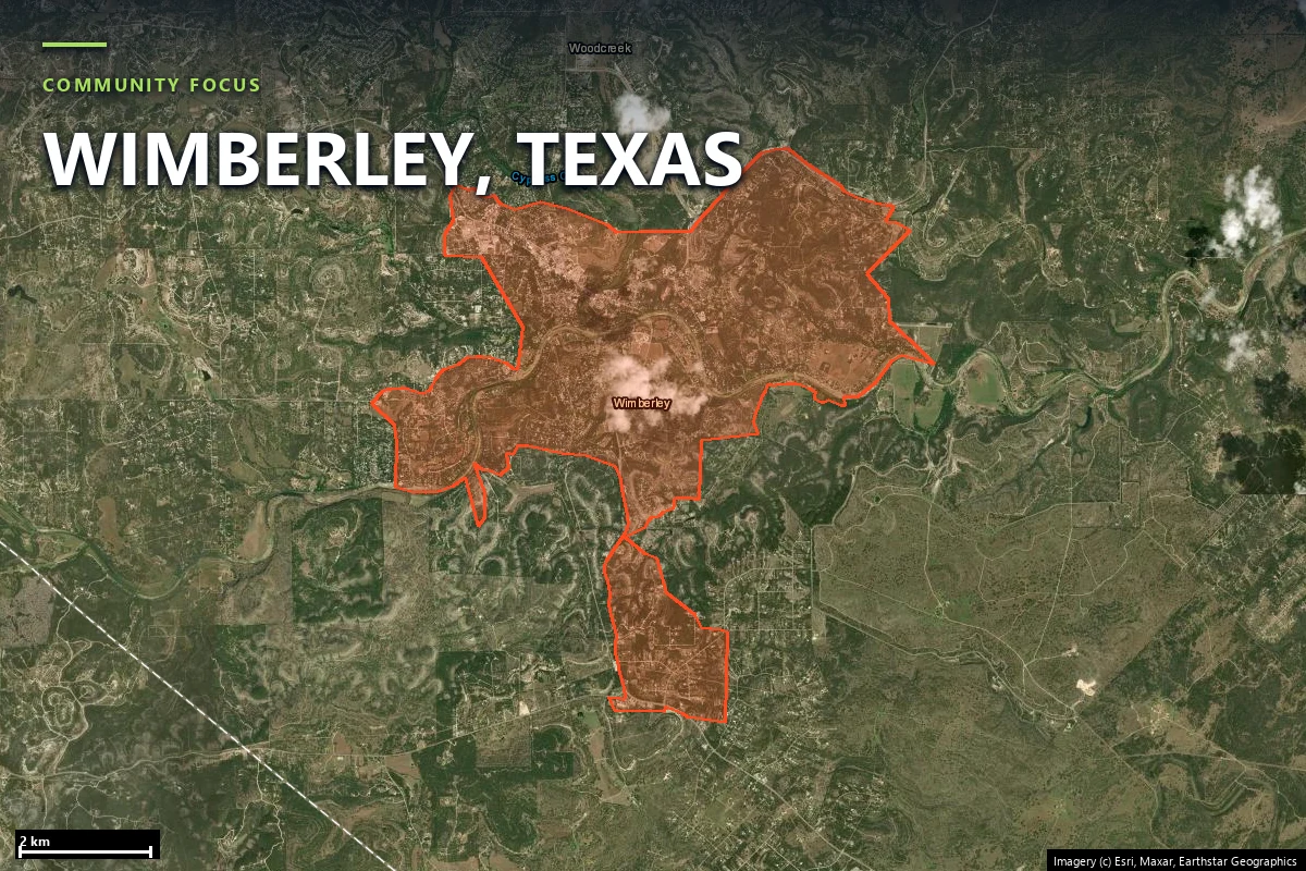 Satellite close-up of the Wimberley case-study area in Hays County showing scattered structures along river and canyon roads through wooded terrain