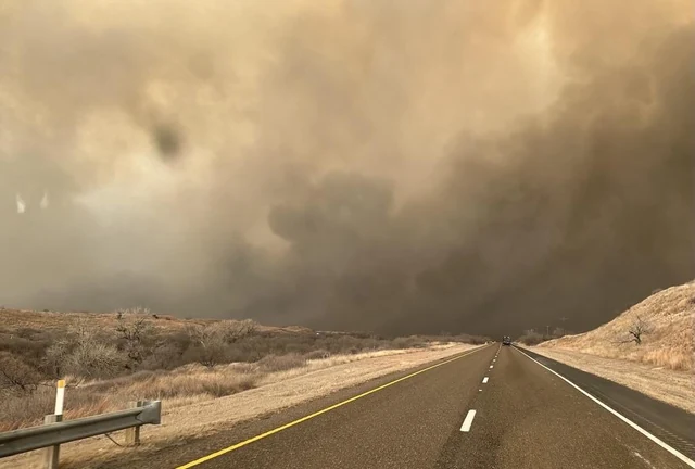 Heavy smoke from the Smokehouse Creek Fire blowing across a road in the Texas Panhandle on the afternoon of 27 February 2024
