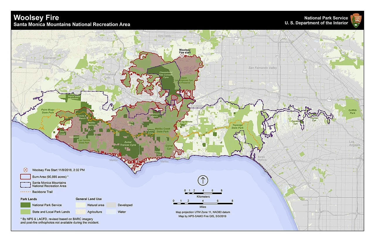 National Park Service map of the 2018 Woolsey Fire burn area across the Santa Monica Mountains National Recreation Area, showing the fire start point near Simi Valley and the burn perimeter reaching the coast at Malibu but stopping short of Topanga