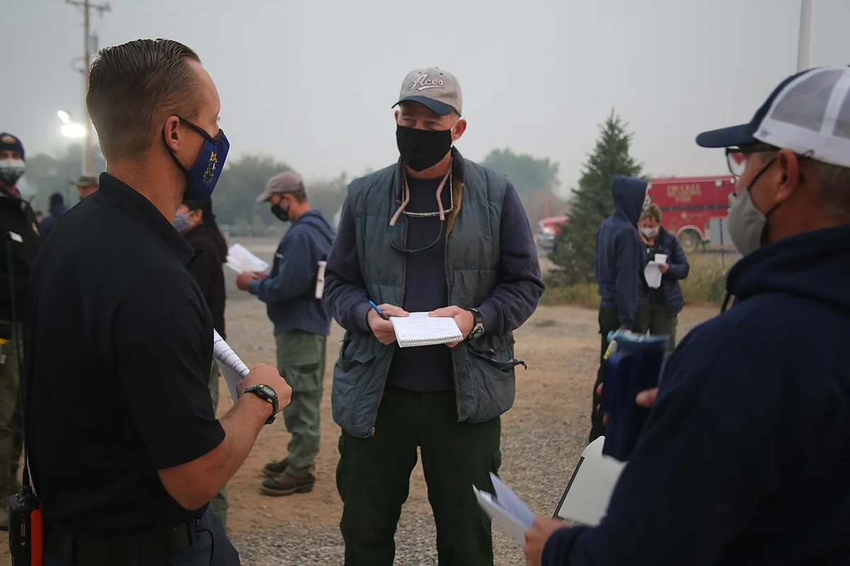 Slink Fire (2020) in Mono County, California - Wildland firefighters for the Slink Fire at morning briefing at Antelope Valley Fire Department in Coleville, California. The Slin