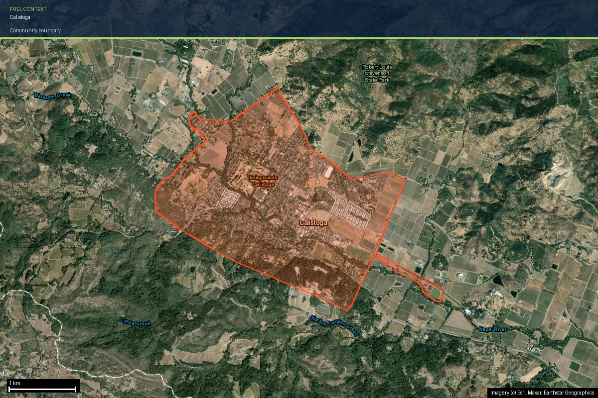 Calistoga community boundary outlined on current satellite imagery, showing the town surrounded by vineyard blocks and forested hillsides near Robert Louis Stevenson State Park