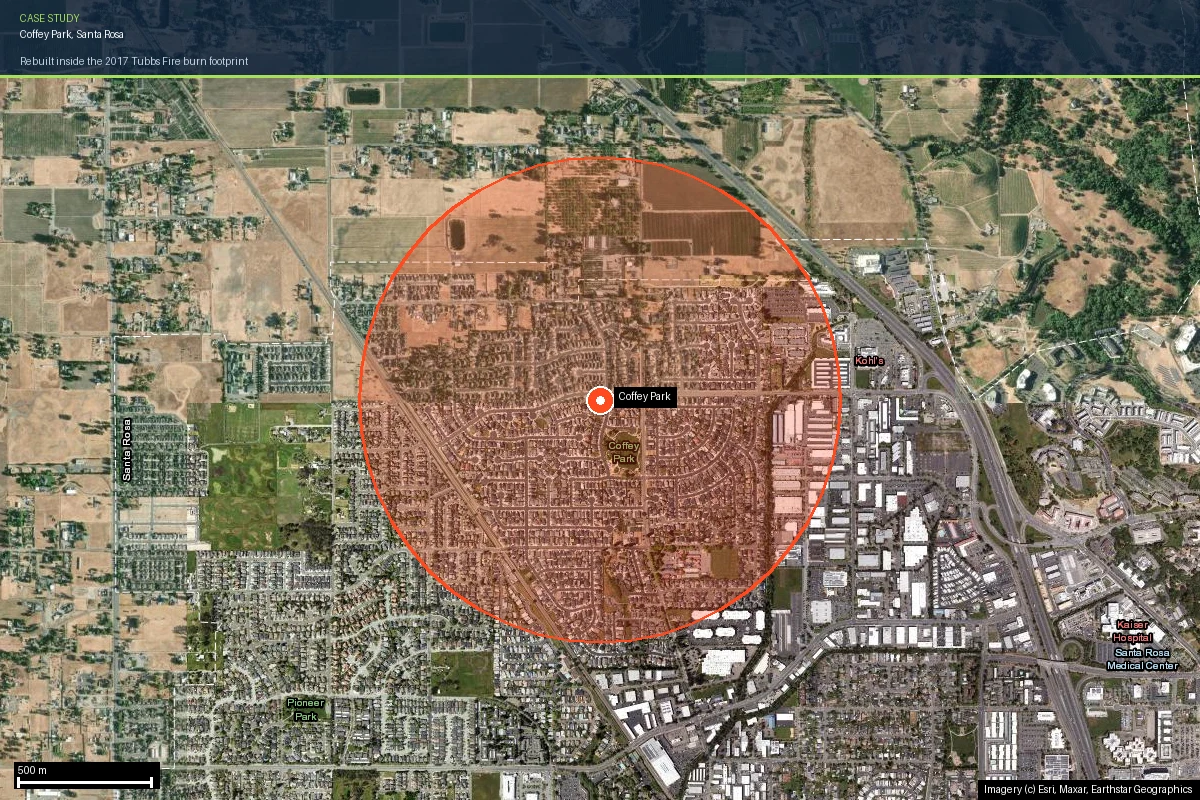 Coffey Park neighborhood boundary outlined on current satellite imagery, showing the fully rebuilt residential subdivision grid in Santa Rosa bounded by open agricultural fields to the north and a commercial corridor to the east